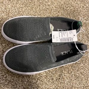 Girls children place shoes